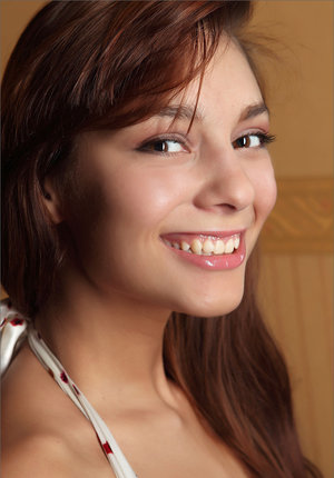 18 year old female Chloe Dash undressing on yoga mat on lawn